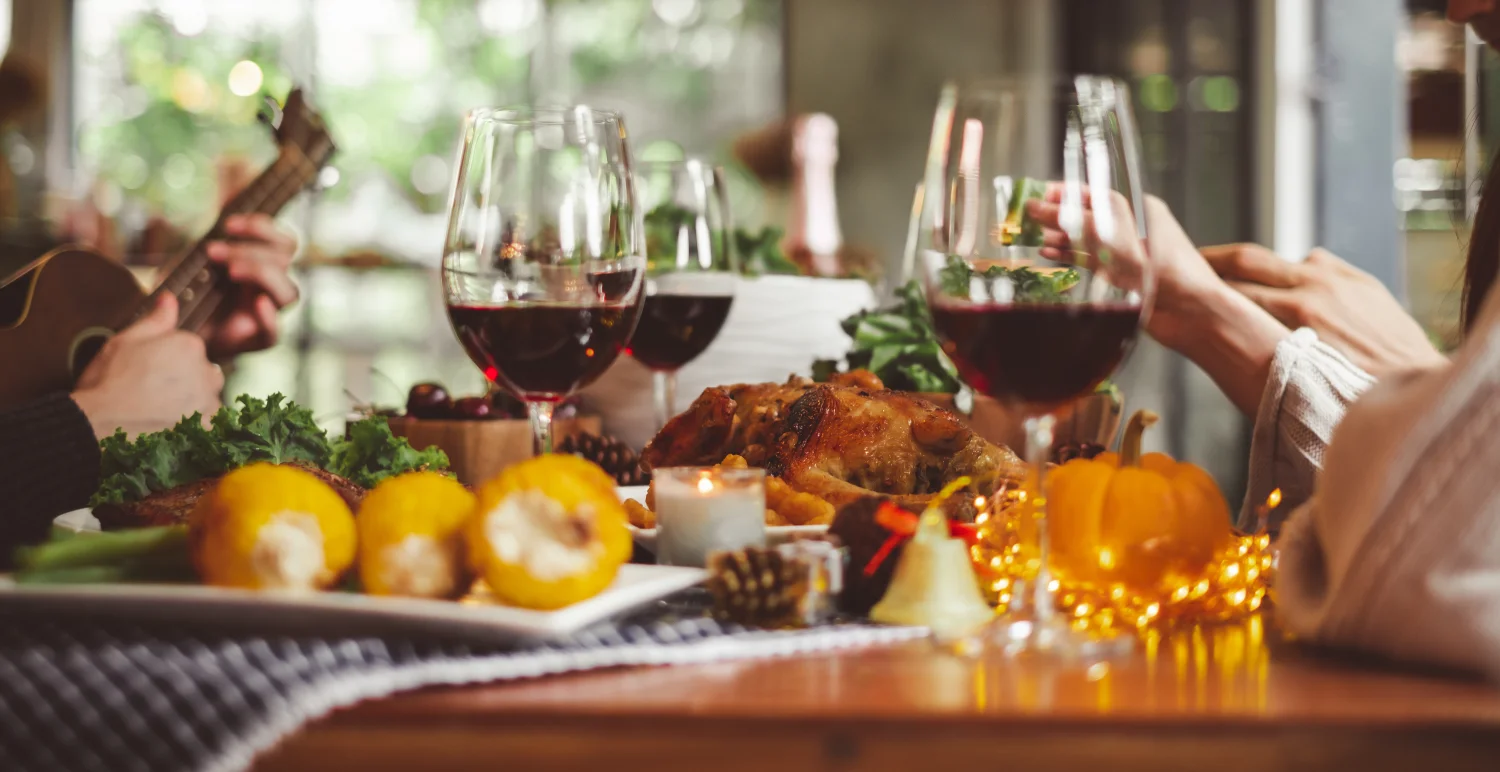 Dinner and drinks at a warmly lit table